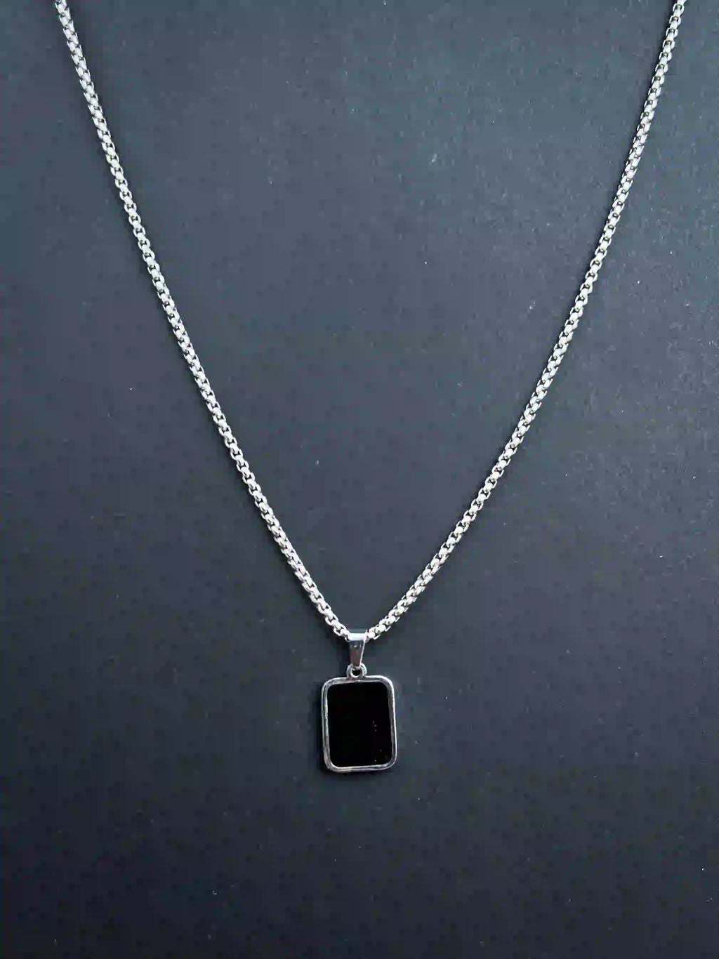 DUAL-SIDED PENDANT